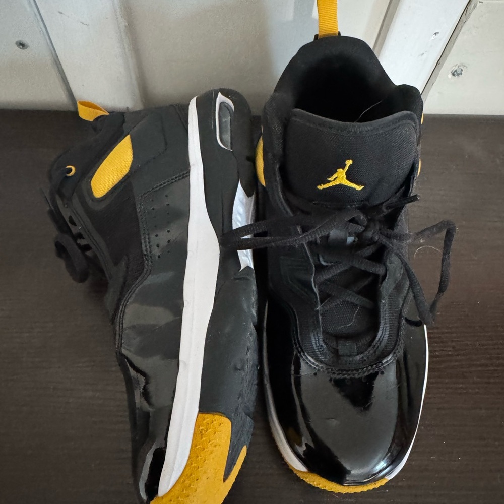Jordan Black and Yellow Sneakers with Bold Accents